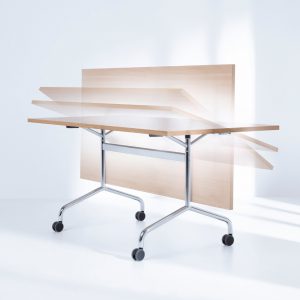 Flib table system with hinged tops.